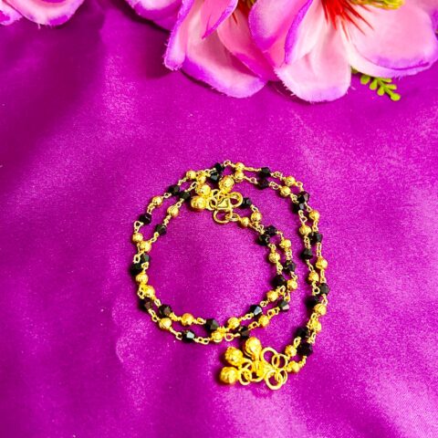 Anklet black and golden beads